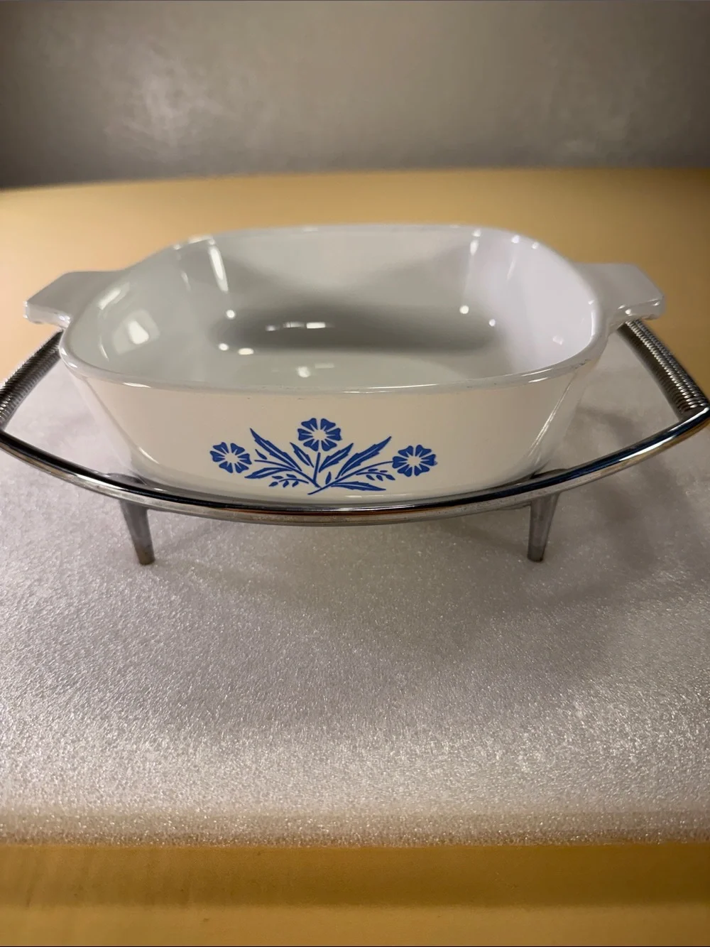 Corning, ware casserole, dish, glass lid, and chrome trivet
